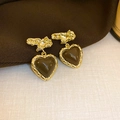 Detail of gold heart drop earrings with smooth deep brown resin on textured fabric - 19# Silver Earring Post - Gold - Coffee - Heart