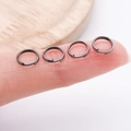 DIY jewelry connector rings in gunmetal grey finish shown on a fingertip for scale - Double Layer-0.7x4mm / Gunmetal