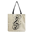 Detail view of musical notes and treble clef print on a beige canvas tote bag - Large Treble Clef Beige Style (hm7332)