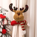 Christmas reindeer curtain tieback with red scarf on white curtain in festive home setting - Cartoon Elk