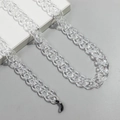 Transparente Brillenlkette aus Acryl mit Silberringen und schwarzen Gummischlaufen - Klarweiß