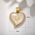 Detail of 18mm x 23mm heart pendant with mother of pearl inlay and gold finish - Gold Interlocking Double Heart