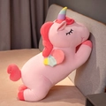 Rosa Regenbogen Einhorn Kuscheltier mit bunten Flügeln und geschlossenen Augen auf Bett - Rosa Einhorn / 25cm(0.1kg)