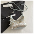 Detail of mint green silk jacquard bag with golden landscape embroidery and pearl pendant - Blue