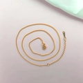 Macro detail of gold-plated stainless steel chain with lobster clasp and extender - Gold Curb Chain