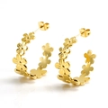 Golden daisy flower stud earrings in 18k gold plated stainless steel on white background - Gold