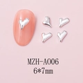 Macro shot of silver heart-shaped nail charms on a soft pink background with 6x7mm size detail - Smooth Surface Heart (A006) / 10 Pieces Pack / Silver
