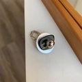Detail of beaded stretch ring with silver beads and translucent dark brown geometric block - Style F Round Shell + Silver Metal Ball
