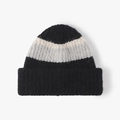 Thick wool knit beanie in black, white, and grey patchwork design for cold winter - Black