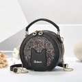 Black circular crossbody bag with cat ear design, glitter finish and plush charm - Black