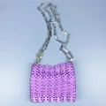 Macro detail of purple sequin crossbody bag showing metal rings and geometric chain - Purple