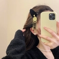 Ethnic style golden Jhumka earrings with elephant design, chains, bells and pearl details - 18# Black Velvet Ethnic Hair Clip