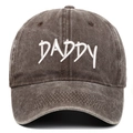 Close-up of white DADDY embroidery on distressed washed denim grey baseball cap - One Size / Coffee