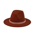 Detail of rust brown wool fedora hat featuring a chunky pink resin chain decoration - Rust Red (10)