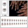 Faux ongles French avec pois noirs et nœuds, ensemble complet de 24 pièces élégantes - Design Noeud à Pois Nude (Y-485)