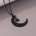 Collier rétro avec pendentif lune et étoile noire aux motifs vintage ajourés - Noir