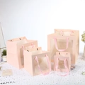 Pink gift bag set with transparent window and ribbon handles in four various sizes - 15*15*15cm / Pink
