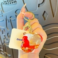 Cloud-shaped liquid keychain with red lucky bag charm and golden sequins - Liquid Lucky Bag (Cloud Shape)