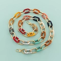 Close-up of colorful resin and gold metal chain strap with rotatable lobster clasps - Threaded Mixed Colors with Gold