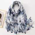 Elegant white floral scarf with blue butterflies and tassel trim in a stylish flat lay - C1138 Blue White Butterfly Floral