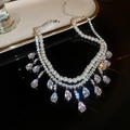 Macro detail of double-layer baroque necklace with white pearls and sparkling zircons - Silver Water Drop Rhinestone Pearl Double Layer