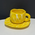 Hand-molded yellow ceramic tulip coffee cup and saucer with white grid pattern - Yellow Rhombus Cup & Saucer