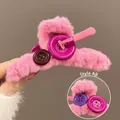 Pink plush hair claw clip with colorful decorative buttons in a soft faux fur style - Button Style / Barbie Pink