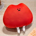 Peluche a forma di fragola rossa con foglie verdi e gambe corte su un tappeto - Portachiavi 10cm