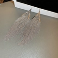 Detailed close-up of long silver tassel earrings with delicate metal chains on display - Silver V-Shape Tassel Ear Hook (73#) / Silver