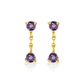 Detailed view of elegant gold-tone drop earrings with two round-cut purple amethyst stones - Purple Zircon