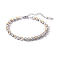 Dettaglio del bracciale bicolore in acciaio inossidabile placcato oro 18K a maglie - Bicolore Oro e Argento