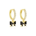 Macro view of S925 silver gold-plated hoop earrings with black enamel bow and zircons - Black (Gold Tone)