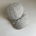 Dettaglio di un cappello da baseball a quadretti con fiocco e trama in tessuto traspirante - M (56-58cm) / Quadri Cachi