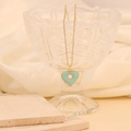 Collier élégant doré avec pendentif cœur émaillé vert menthe et design creux circulaire - Bleu