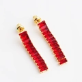 Elegant gold earrings with dangling red elongated gemstones for a stylish look - Earrings