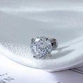 Polished titanium steel stud earring with four-prong set sparkling zircon on a stand - White