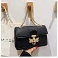 Black snake-pattern crossbody bag with gold bee buckle and chain strap for women - Black