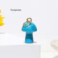 Mini mushroom pendant made of natural blue turquoise with a gold metal loop - Blue Turquoise