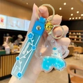 Blauer Einhorn-Blumen-Flüssigsand-Schlüsselanhänger mit Sternen und Silikonband - Sakura Einhorn-Blau
