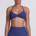 Detail of blue-purple halter neck sports bra with ruched front and high-stretch fabric - Dark Navy Blue