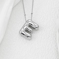 Close-up of a silver balloon style letter E pendant on a delicate bead chain necklace - Letter E Pendant