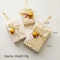 Three-piece set of white and gold Christmas gift boxes with festive tags and strings - Gold 3-Piece Set