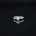 Elegant silver Moissanite ring featuring a brilliant round cut stone with classic six-prong setting - US 7 / Steel