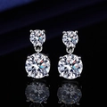 Detailed close-up of double-round moissanite stud earrings with elegant mirror reflection - Geometric Earrings Led-25