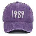 Macro detail of 1989 embroidery on a vintage washed purple cotton baseball cap - Purple