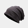 Detail of dark grey knit slouchy beanie showing texture and rolled edge design - One Size / Dark Gray