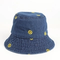 Detail of yellow embroidery smiley face pattern on navy blue denim bucket hat material - M (56-58cm) / Dark Blue
