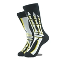 Détail de chaussettes noires avec motifs d'os de squelette blancs et jaunes sur fond uni - Taille unique / Mains de Squelette Noires (142)