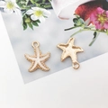 Starfish charms in gold alloy with white enamel for DIY jewelry and necklaces - Ocean Starfish / 15x18mm