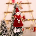 Angelo di Natale in peluche rosso con ali dorate e ciondolo a forma di fiocco di neve - Angelo con Gambe a Penzoni Rosso